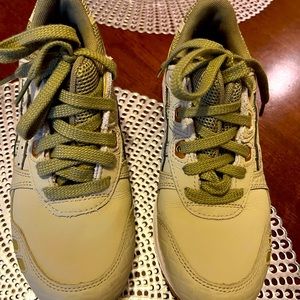 Sage or olive and gold Asic tennis shoes